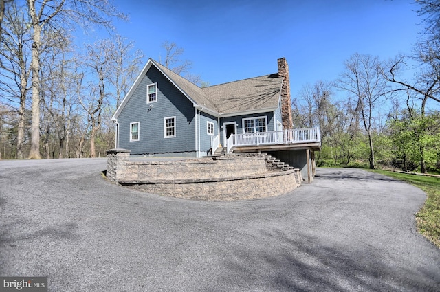 view of front of property with a deck