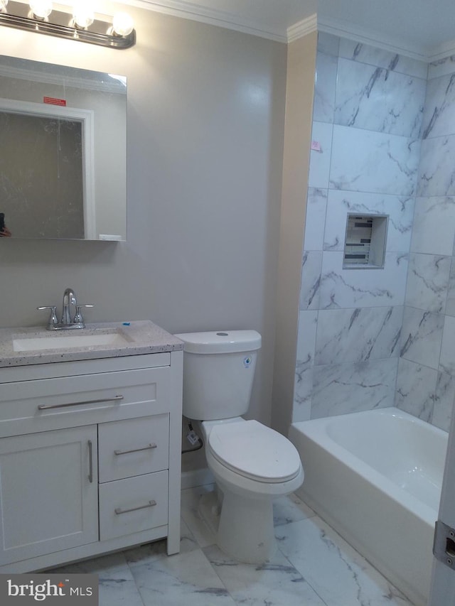 bathroom with a bathing tub, vanity, toilet, and crown molding