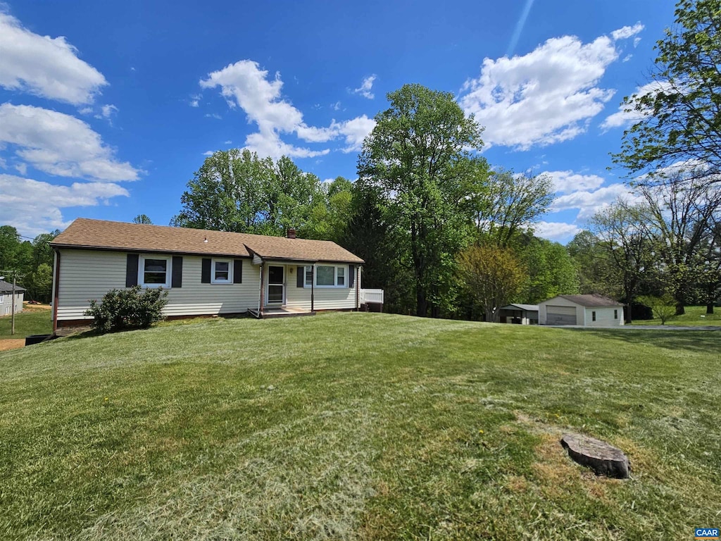 ranch-style house with a front yard