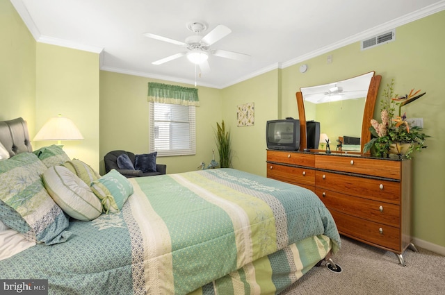 bedroom featuring ceiling fan, light colored carpet, and ornamental molding