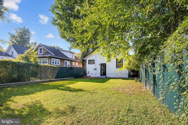 view of yard featuring central AC