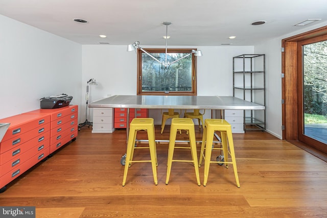 dining area featuring hardwood / wood-style floors