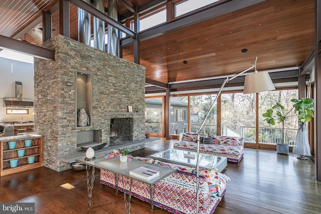 living room featuring wooden ceiling and a high ceiling