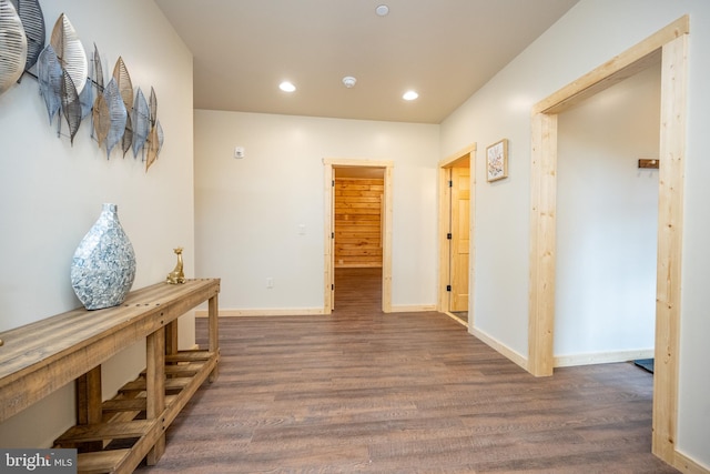 hallway featuring dark wood-type flooring