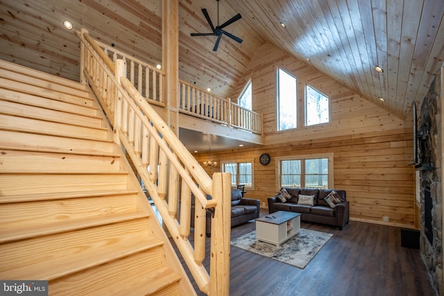 stairs featuring high vaulted ceiling, wooden ceiling, hardwood / wood-style floors, and ceiling fan