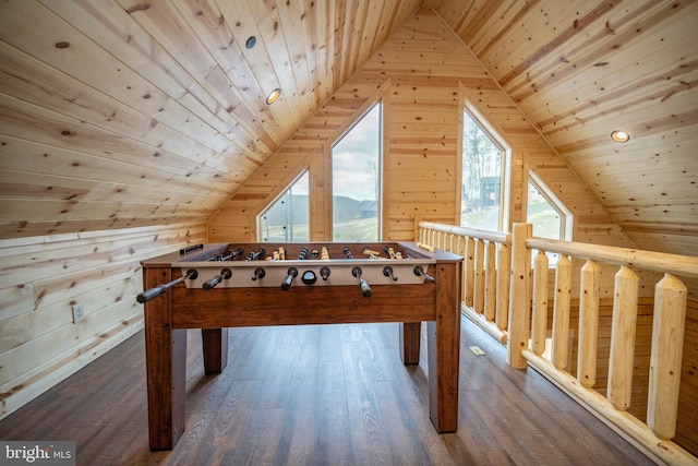 recreation room featuring wooden ceiling, dark wood-type flooring, wooden walls, and vaulted ceiling