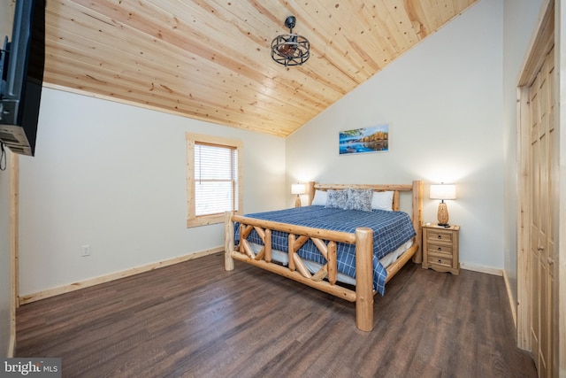 bedroom with wooden ceiling, dark hardwood / wood-style flooring, and vaulted ceiling