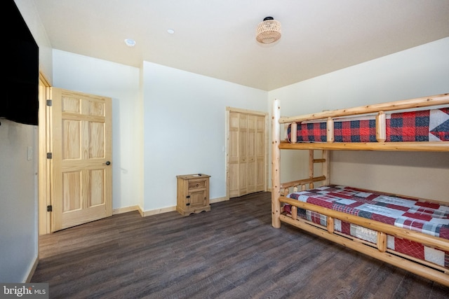 bedroom featuring dark hardwood / wood-style floors