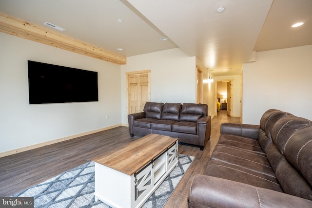 living room featuring dark wood-type flooring