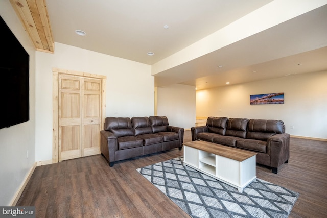 living room featuring dark hardwood / wood-style floors