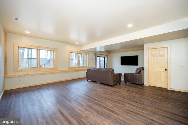 living room with dark hardwood / wood-style floors