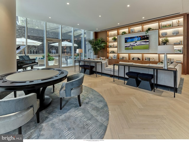 301 S Broad Unit 804, Philadelphia, PA 19107 - dining area with light parquet flooring, a healthy amount of sunlight, and expansive windows
