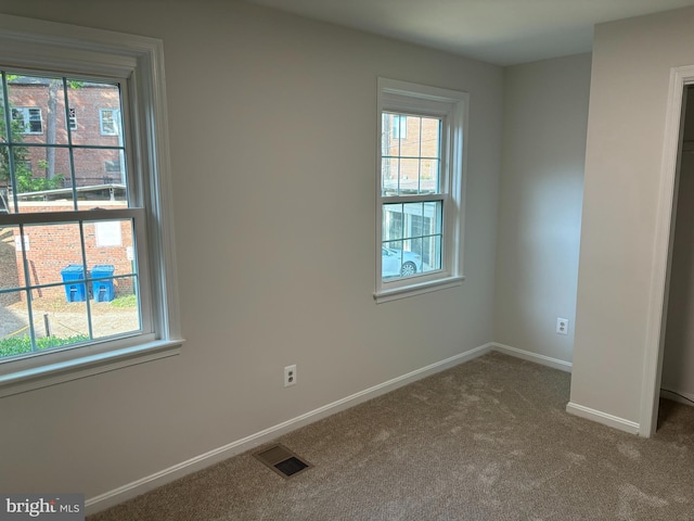 3820 V St SE Unit 202, Washington, DC 20020 - carpeted spare room featuring healthy amount of natural light