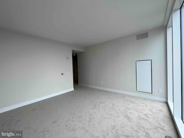 spare room with carpet