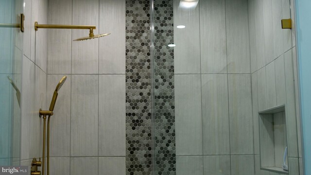 1707 Bay St, Fenwick Island, DE 19944 - bathroom featuring tiled shower