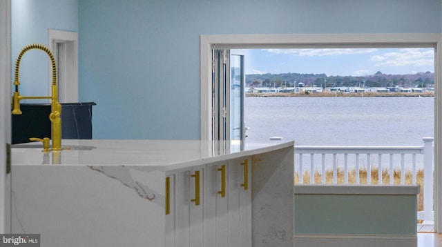 1707 Bay St, Fenwick Island, DE 19944 - interior space with a water view and a sink