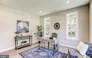 4712 Carroll Manor Rd, Baldwin, MD 21013 - home office with plenty of natural light, wood finished floors, baseboards, and recessed lighting