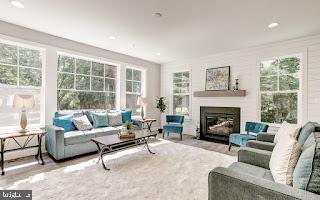 4712 Carroll Manor Rd, Baldwin, MD 21013 - living room featuring plenty of natural light, a fireplace, and recessed lighting
