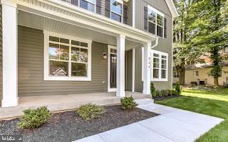 4712 Carroll Manor Rd, Baldwin, MD 21013 - property entrance featuring covered porch and a lawn