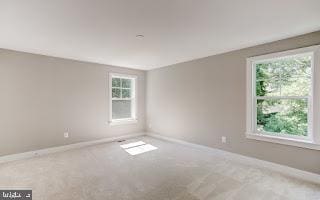 empty room with carpet floors