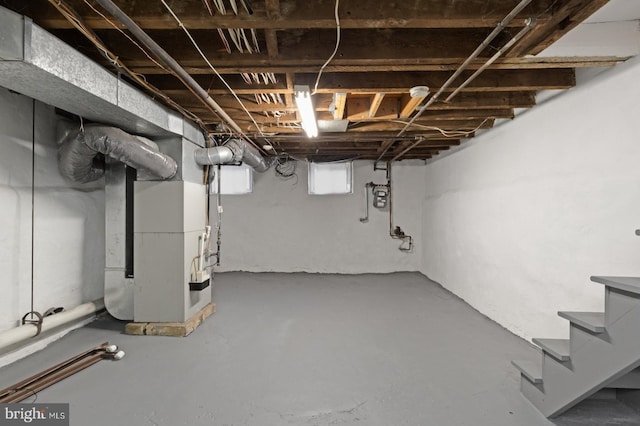 basement featuring heating unit