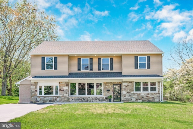 view of front of house with a front lawn