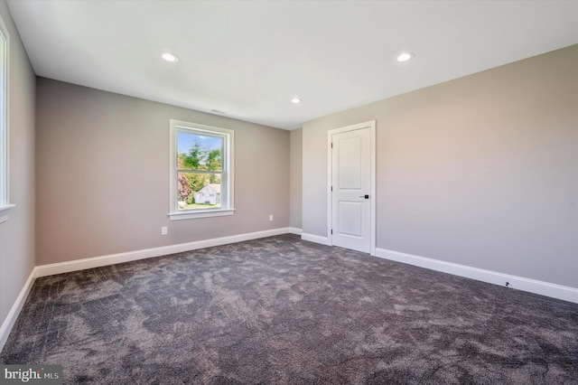 empty room featuring carpet floors