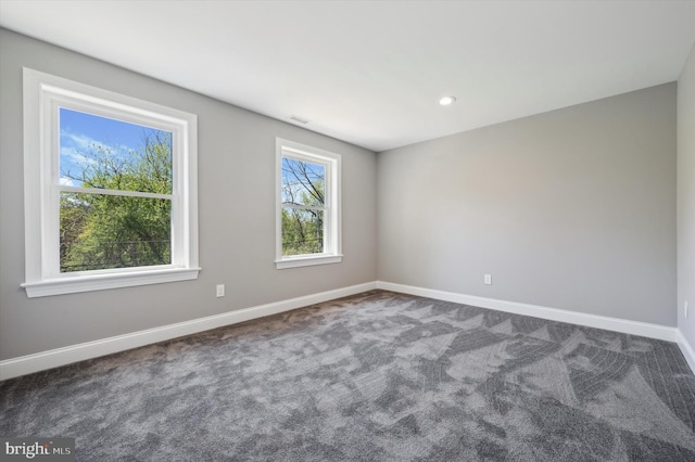 view of carpeted spare room