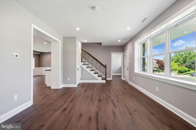 interior space with dark wood-type flooring