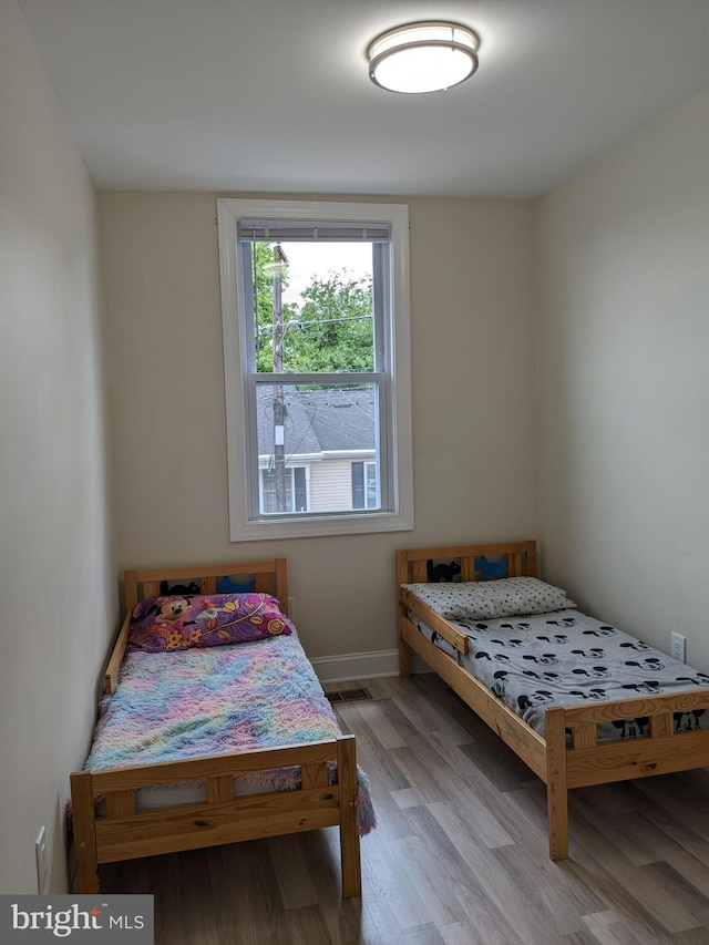 bedroom featuring light hardwood / wood-style floors