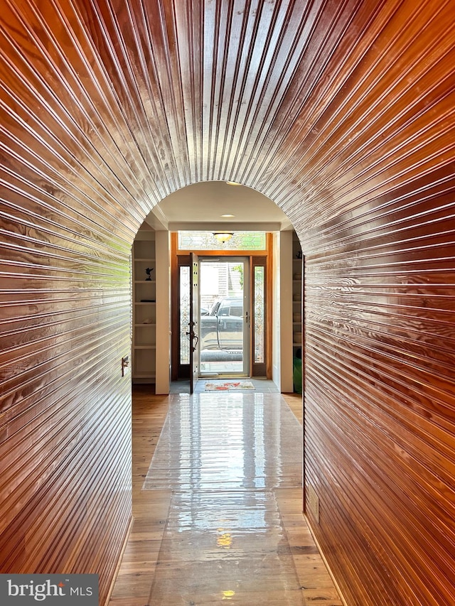 corridor with arched walkways