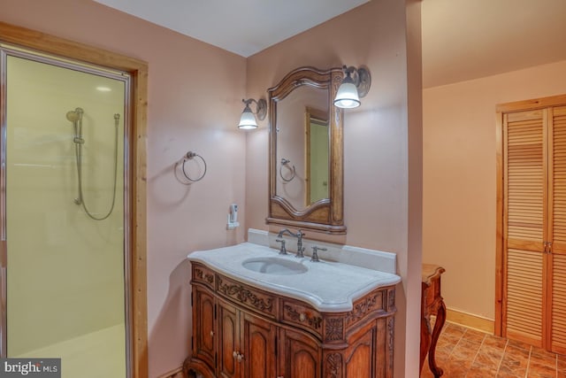 bathroom with vanity and walk in shower