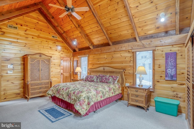 carpeted bedroom with wood ceiling, visible vents, vaulted ceiling with beams, and wood walls