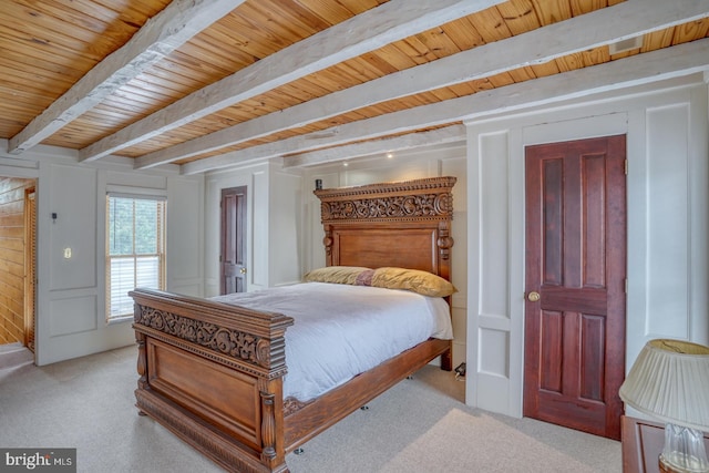 bedroom with wooden ceiling, light carpet, beamed ceiling, and a decorative wall