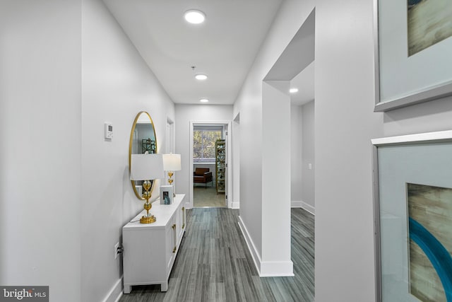 hallway featuring dark wood-type flooring