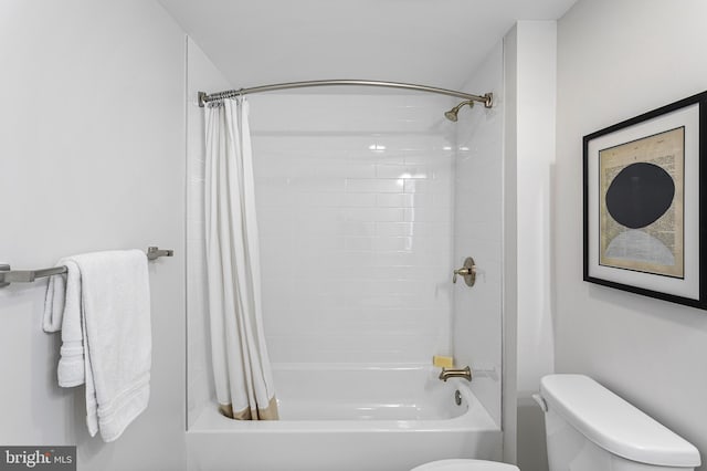 bathroom with toilet and shower / tub combo with curtain