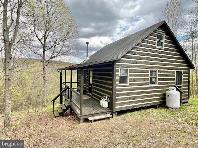 view of home's exterior featuring an outdoor structure