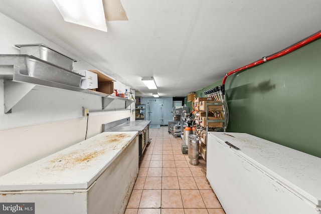 kitchen featuring light tile flooring