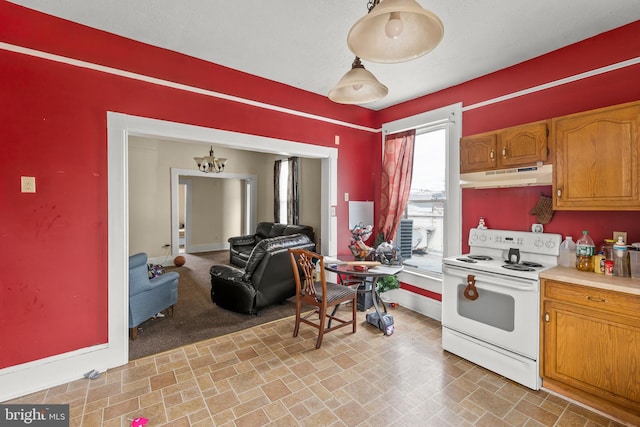 kitchen featuring carpet floors and white electric range