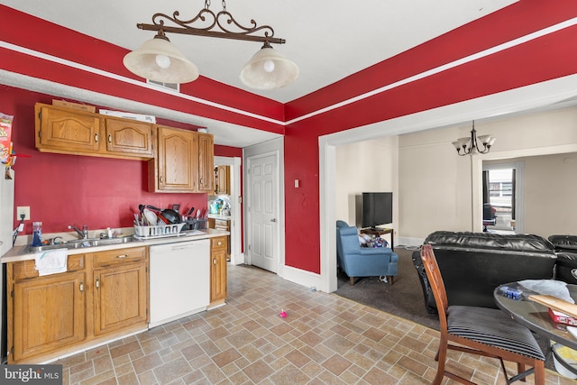 kitchen featuring a chandelier, light tile floors, pendant lighting, and white dishwasher