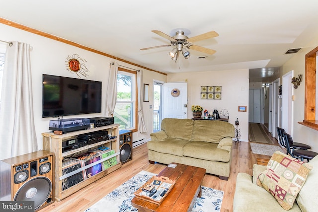 living room with light hardwood / wood-style flooring, ceiling fan, a baseboard heating unit, and crown molding