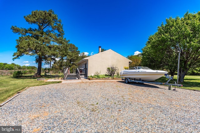 exterior space with a front lawn