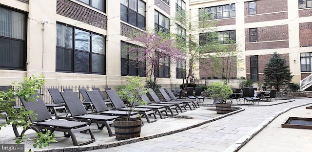 view of home's community featuring a patio area