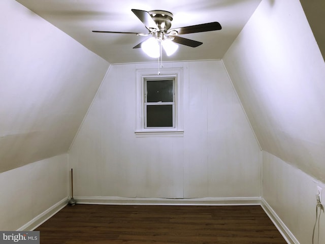 bonus room featuring lofted ceiling, ceiling fan, and dark wood-type flooring