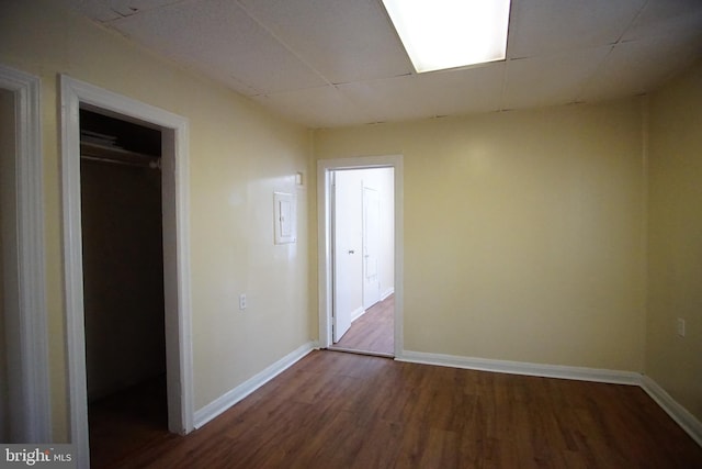 unfurnished bedroom with hardwood / wood-style floors