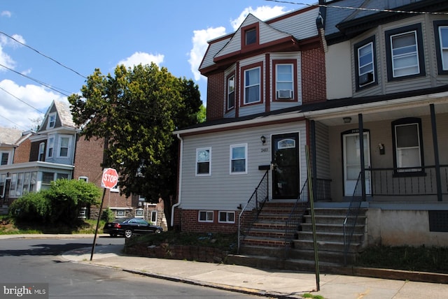 view of front facade featuring cooling unit