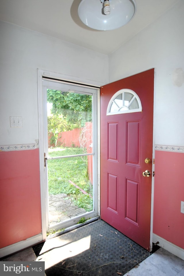 foyer entrance featuring plenty of natural light