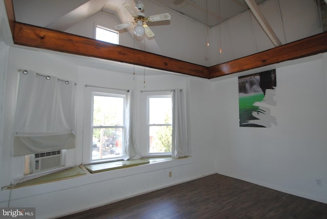 spare room featuring ceiling fan, cooling unit, dark hardwood / wood-style floors, and vaulted ceiling