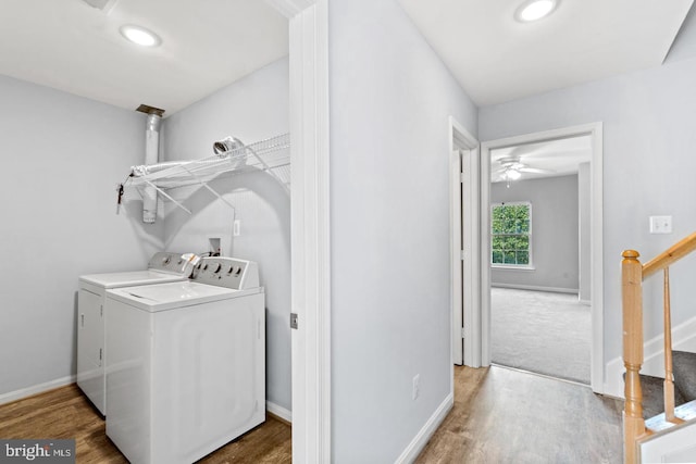 washroom with hookup for a washing machine, light hardwood / wood-style flooring, separate washer and dryer, and ceiling fan