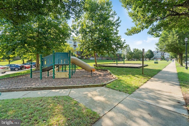 view of jungle gym featuring a yard